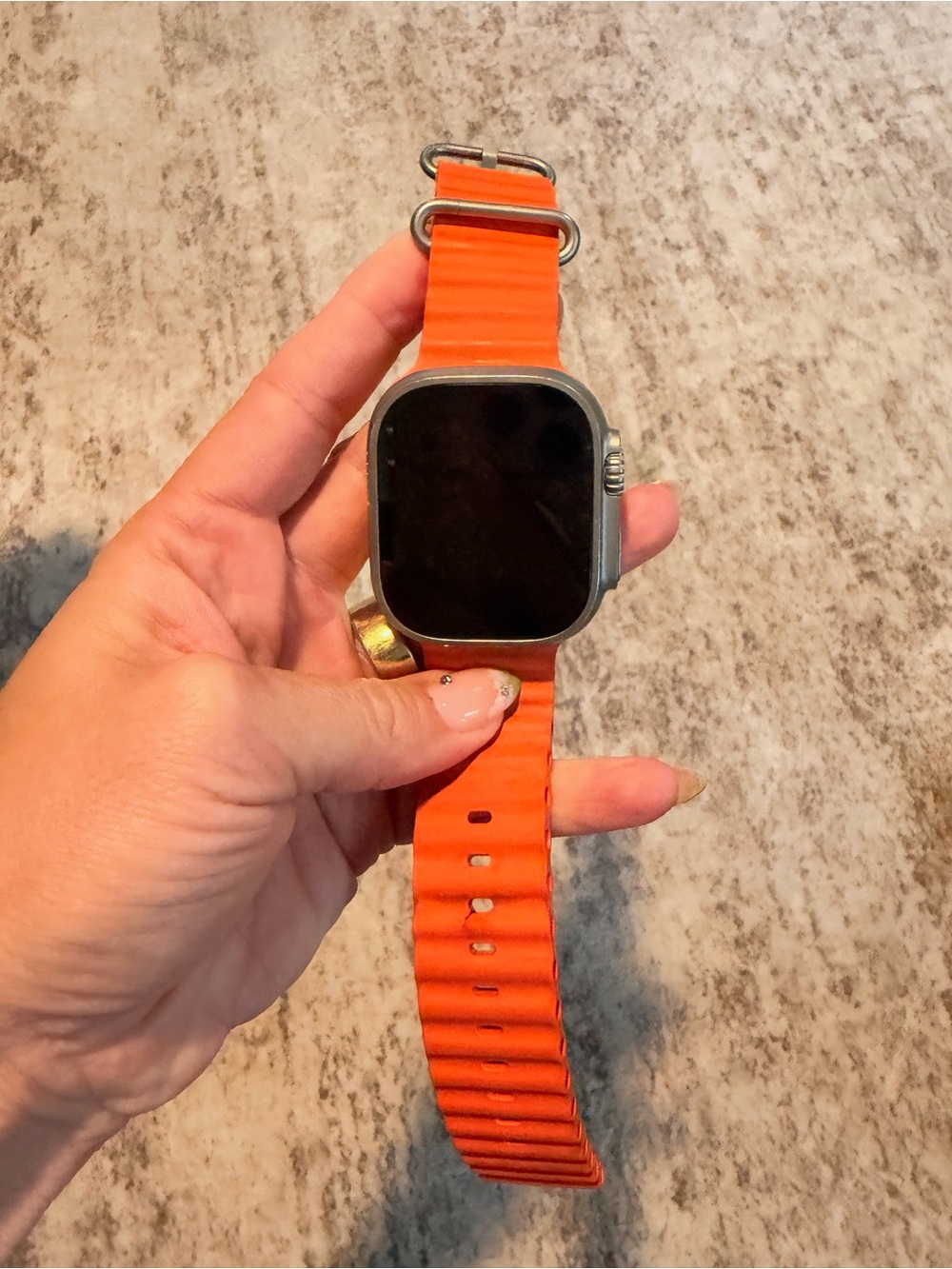 Apple Smartwatch with Vibrant Orange Silicone Band and Silver Case